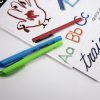 Quick Draw Paper and multicolored pens with example drawings