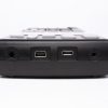 Top side view of audio, charger, USB, and serial ports