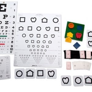 A variety of acuity measurement charts, symbol cards, and a puzzle board laid out on a white background.