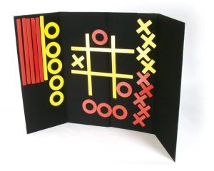 Tic-Tac-Toe accessory kit components displayed on tri-fold Invisiboard
