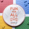 An assembled Reach and Match kit with the "FUN FOR ALL" tile carrying case placed in the center.