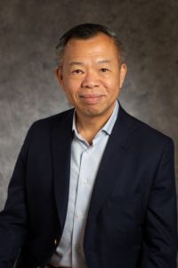 Portrait of Yung Nguyen Smiling