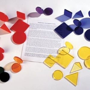 blue, yellow, and red plexiglass pieces in squares, rectangles, and circles on a white surface.