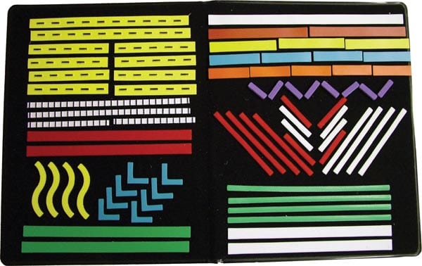 A variety of textured stripes on a black felt background