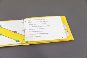 Gobs of gum - A story clipped into the yellow OTWL sound page with two digital device recorders inserted. On the left is an illustration that accompanies the story's description of a banister covered in gum.