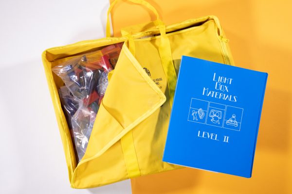 Light Box Materials Kit level 2 with blue book and yellow carrying bag