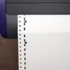 White Fanfold Tractor Feed Braille Transcribing Paper Feeding Into Braille Printer Top View