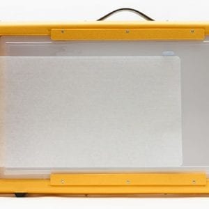 a hand setting the Dycem on the Light Box