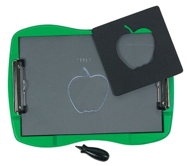 A tactile graphic of an apple drawn on tactile drawing film is attached to the green TactileDoodle frame. It has a braille label above it. The apple-shaped stencil is laid against the top right corner of the frame, and a black stylus rests below.