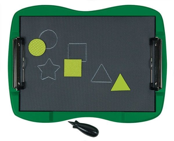 Tactile white outlines of a circle, a star, a square, and a triangle have been drawn on tactile drawing film attached to the green TactileDoodle frame. Yellow stencils are positioned around the page, and a black stylus sits below the frame.