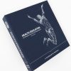 The blue Health Education for Students with Visual Impairments guidebook binder is angled against a white background. On the cover is a white geometric graphic of a woman jumping.