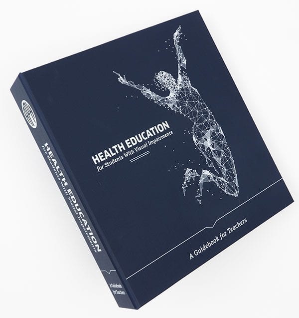 The blue Health Education for Students with Visual Impairments guidebook binder is angled against a white background. On the cover is a white geometric graphic of a woman jumping.