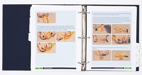 An aerial view of two pages in an open Health Education guidebook from the Sex Education section. The page contains a series of images demonstrating the steps to build a model.