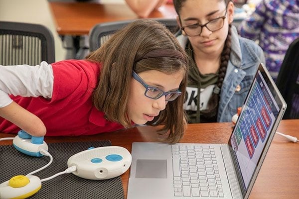 two students playing a Code Jumper sequence