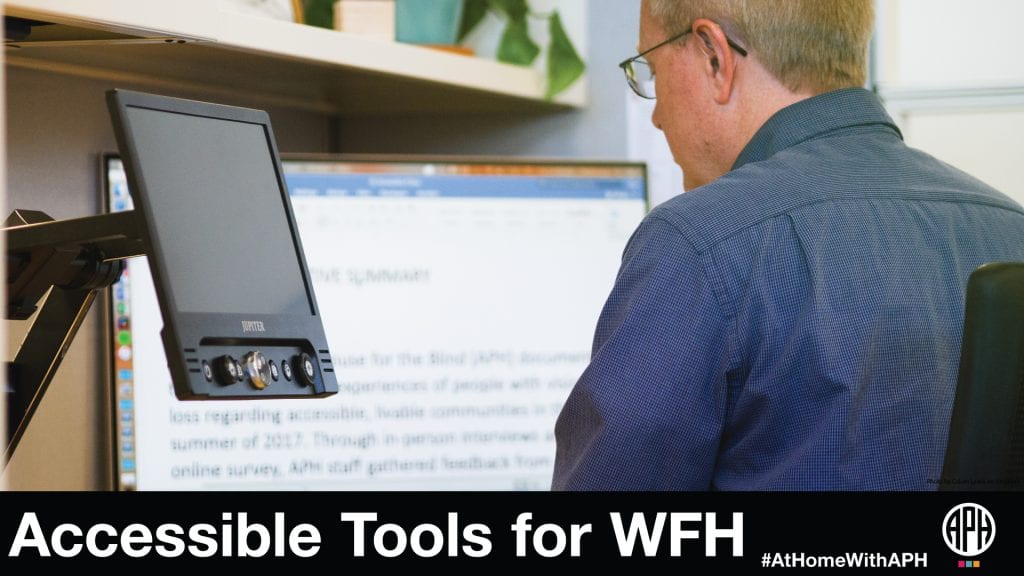 a man wearing glasses working on a monitor with increased magnification. text reads 