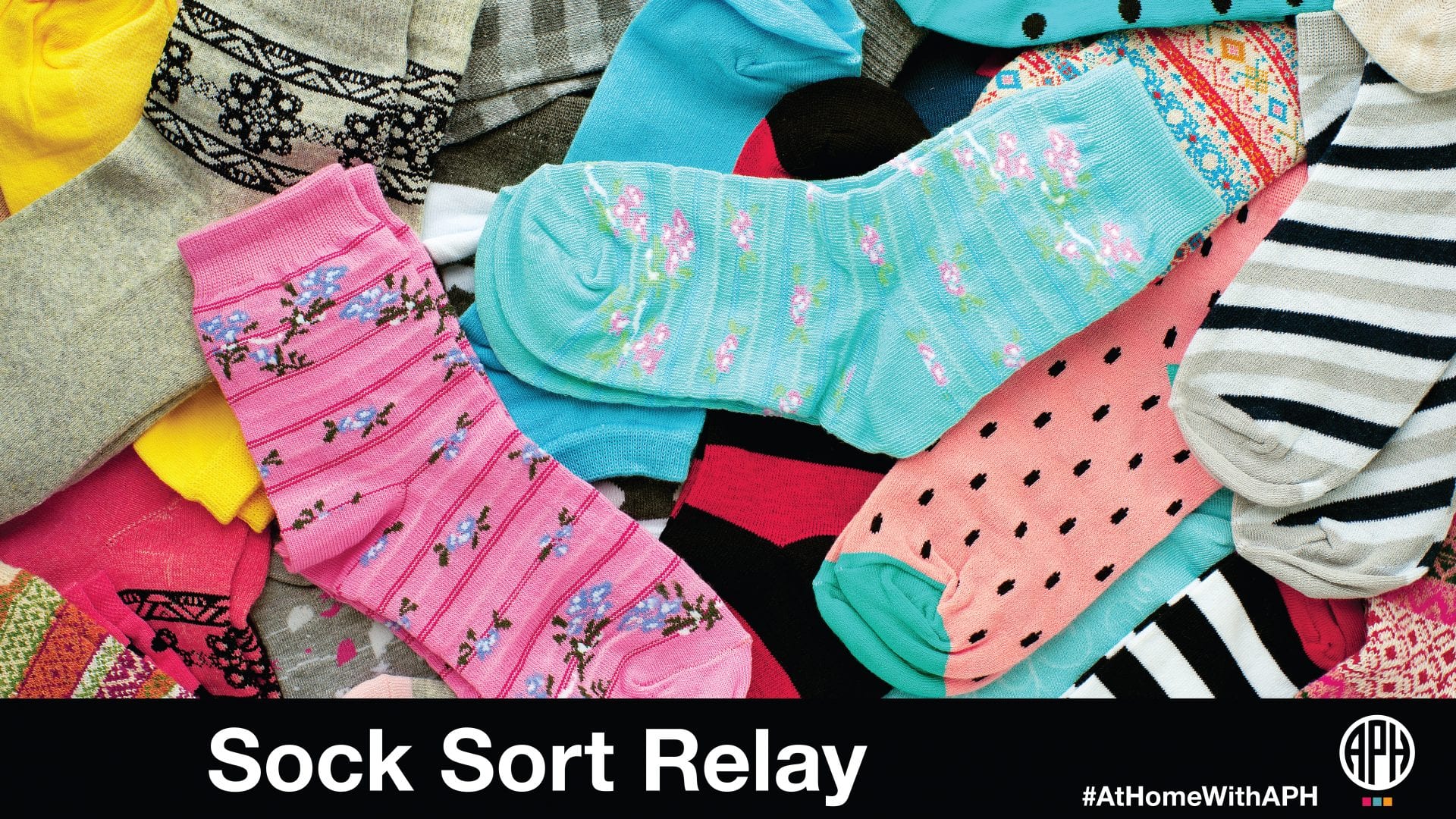 a pile of a variety of colorful socks. Text reads "Sock Sort Relay #AtHomeWithAPH" APH Logo