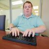 User typing with both hands