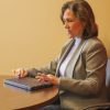 User typing in a meeting on the Mantis Q40