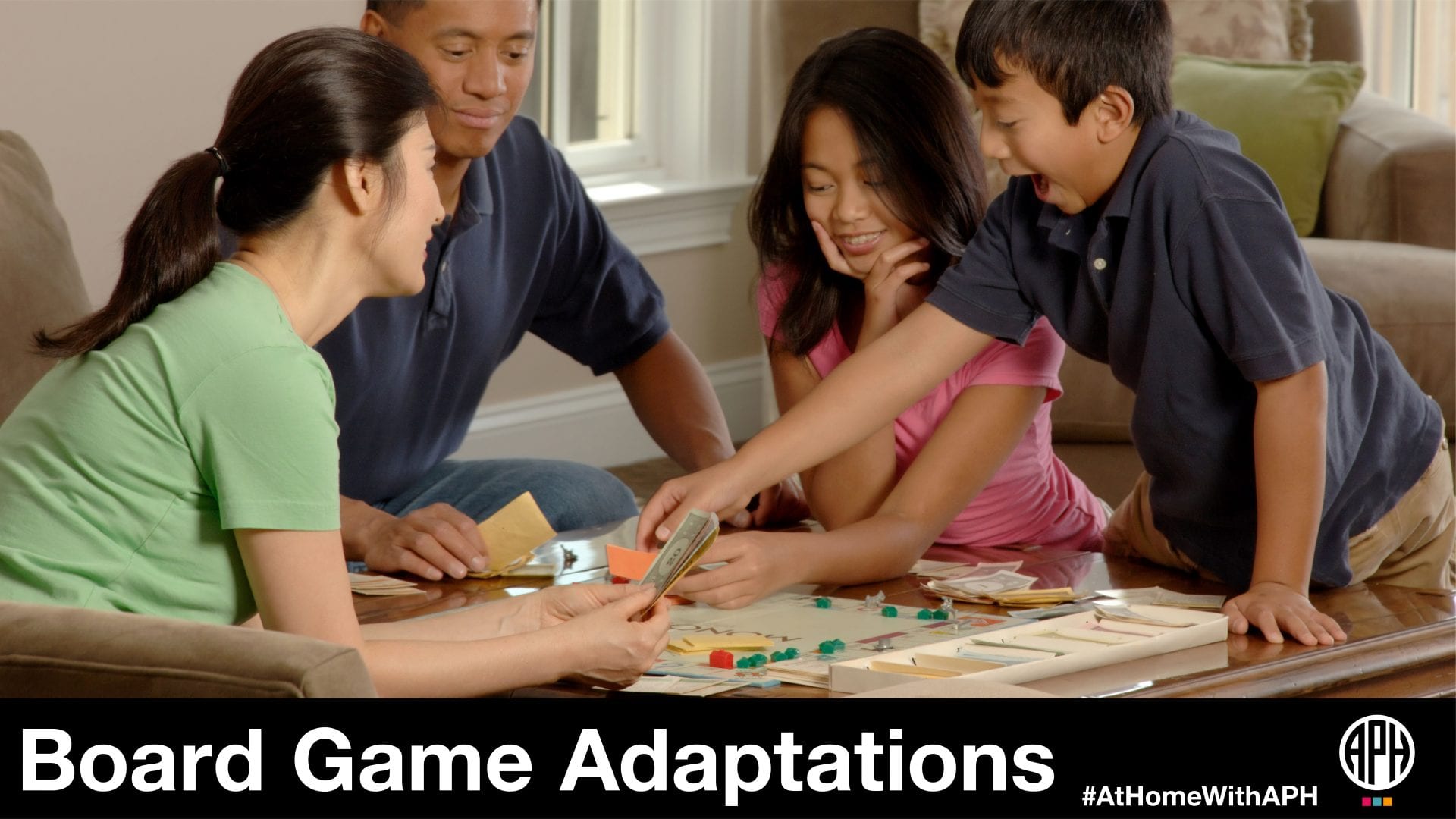 a family sitting around playing a board game and smiling. text reads "Board Game Adaptations #AtHomeWithAPH"