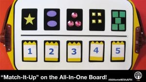 image of an all-in-one board with match-it-up pieces on it 