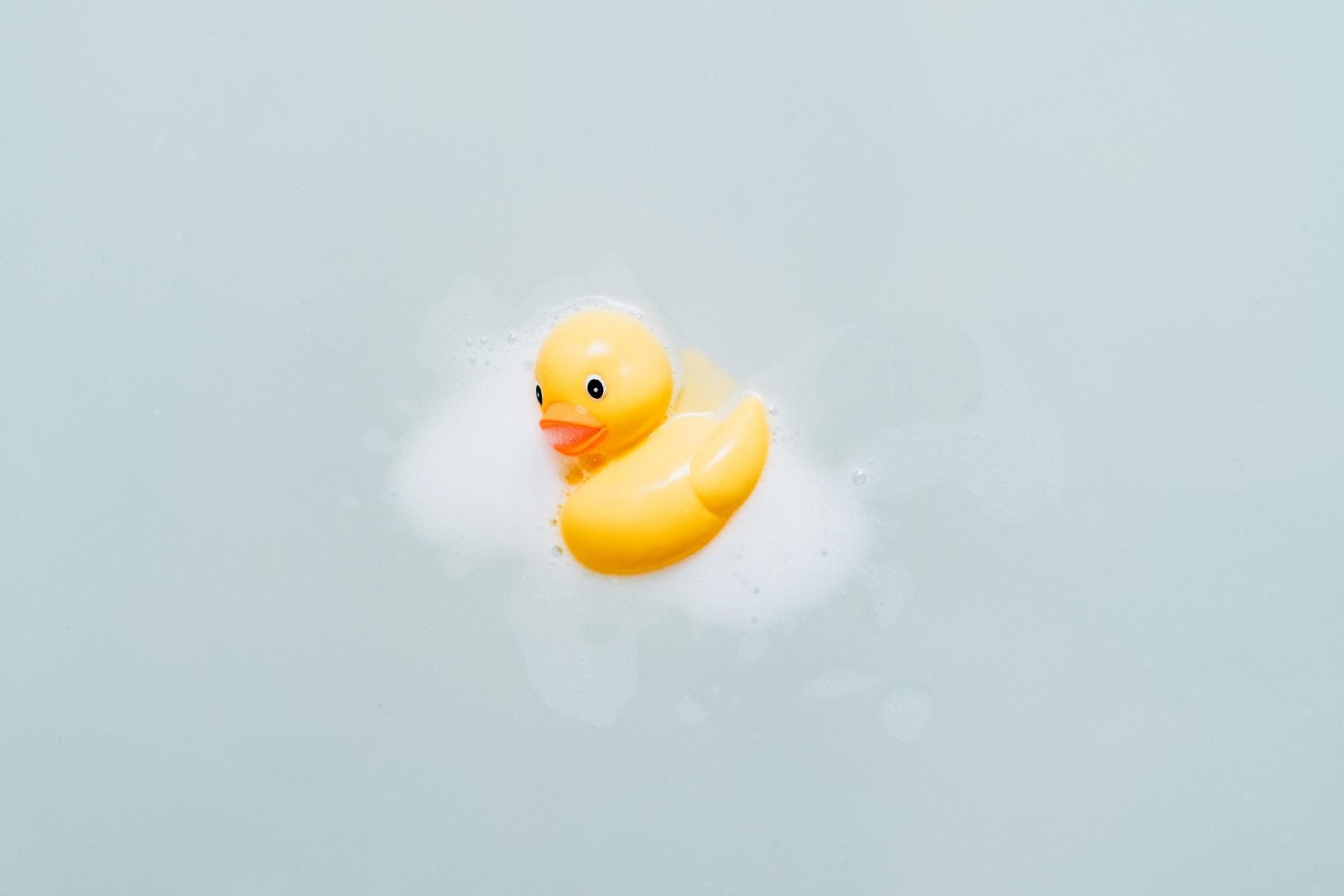 a rubber ducky floating water