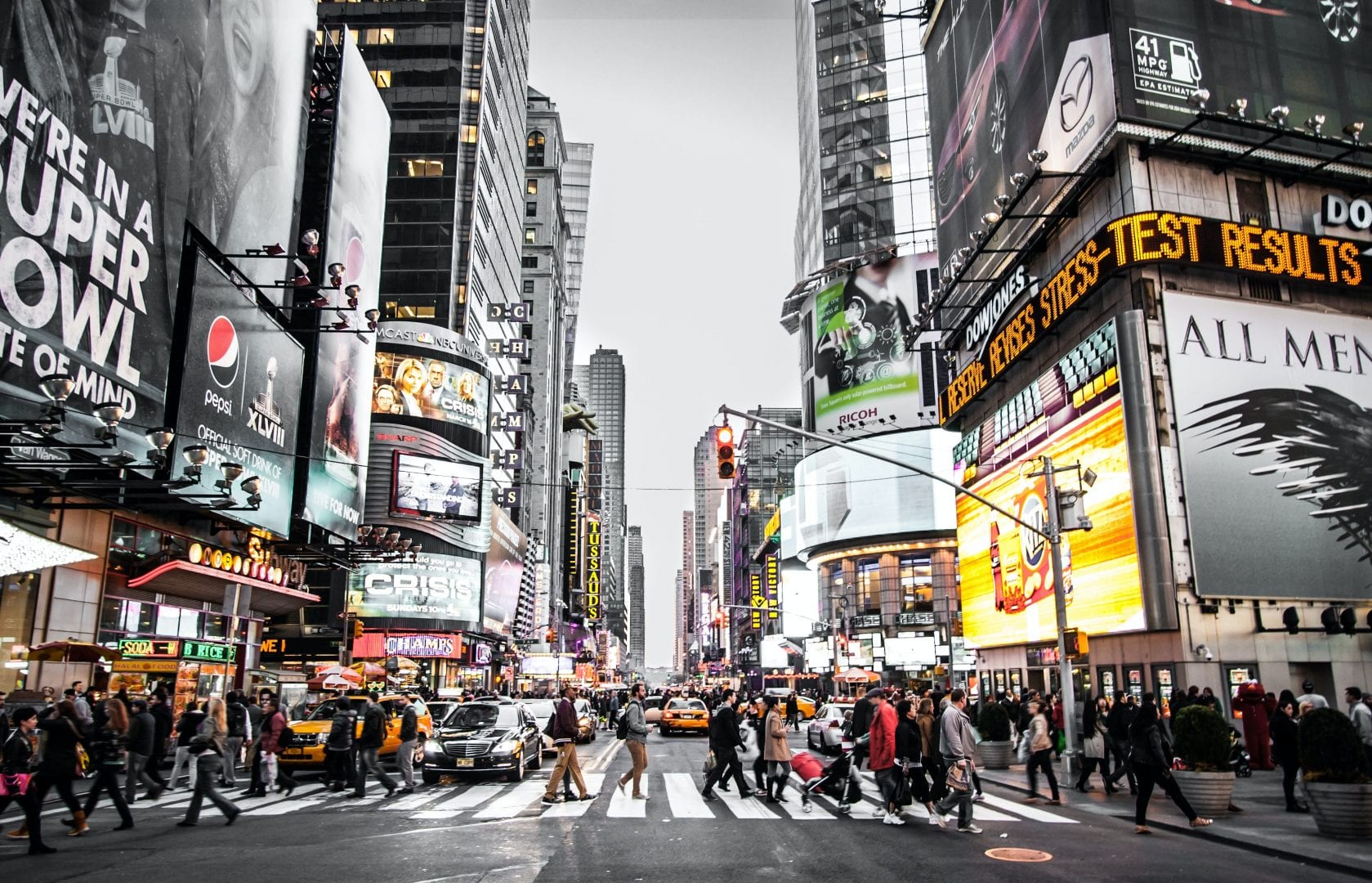 busy new york city street with lots of pedestrians