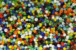 a bunch of colorful pony beads