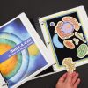 Print Build-A-Cell Student and Teacher Guide cover and Build-A-Cell Color / Tactile Structure Kit binder opened to show the plant cell.