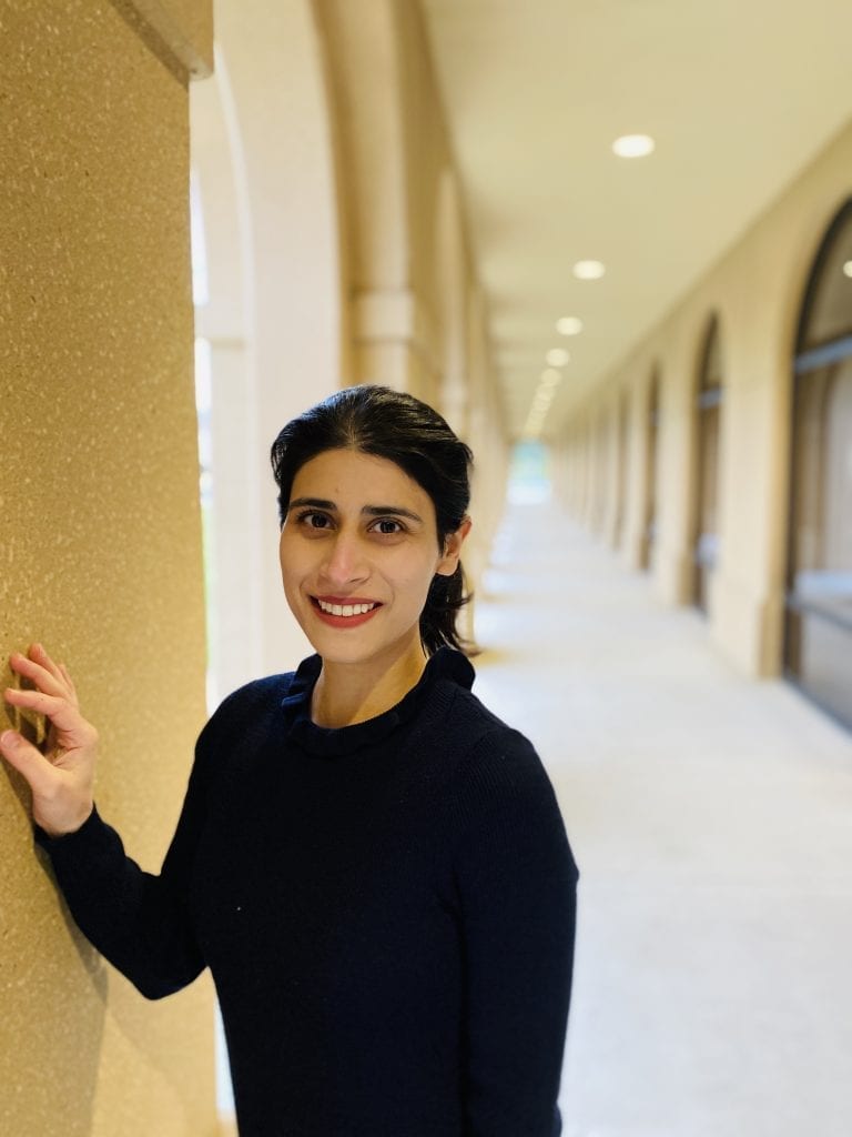 a photo of Nabiha standing in a hallway