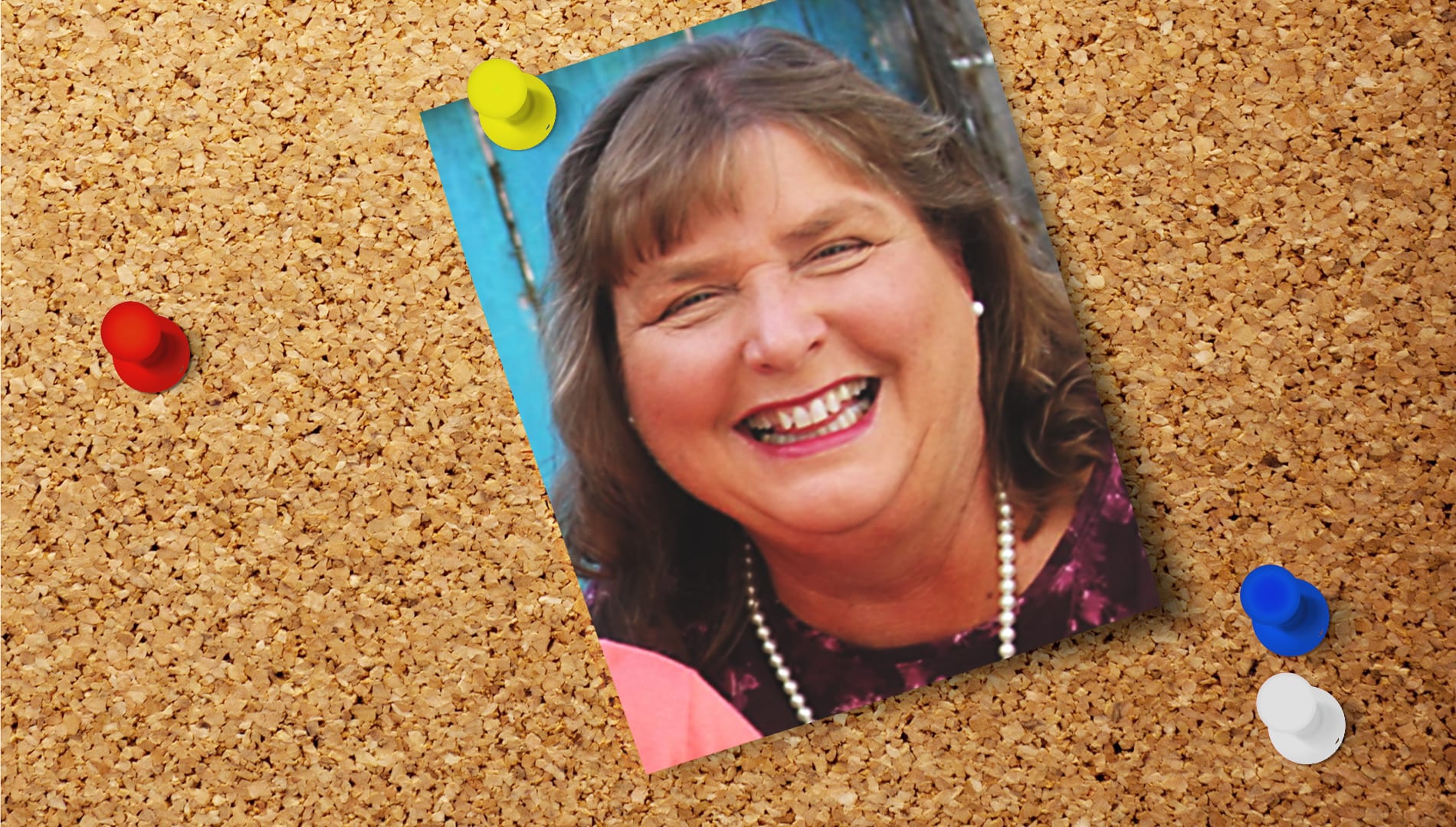 a photo of Barbara Peterson pinned to a cork board