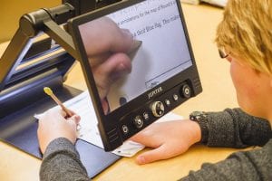 close up of a student using Jupiter to magnify their school work