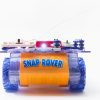 Front view of RC Snap rover, a bread board covered in snap circuits pieces sitting on a frame with wheels.