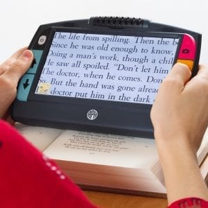 Juno device magnifying book text for a reader