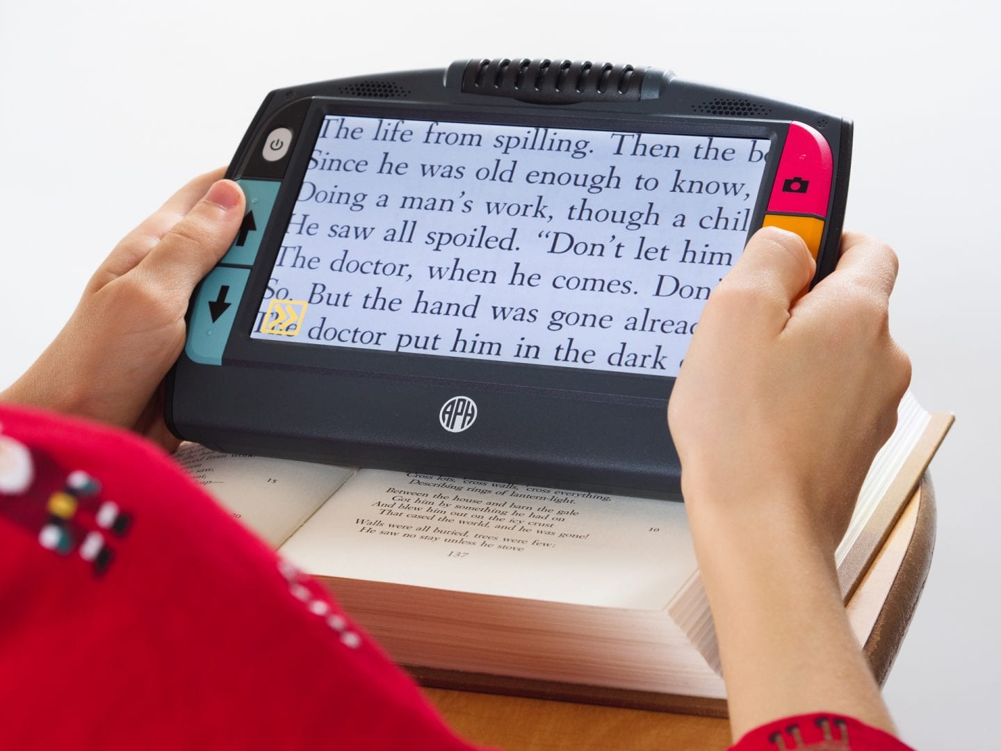 Juno device magnifying book text for a reader