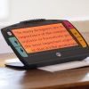 Juno magnifying text orange background black font