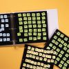 Word PlayHouse kit laid out including black felt board and yellow and white word manipulatives.
