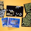 Word PlayHouse kit laid out including binder, black felt boards, and yellow and white word manipulatives.
