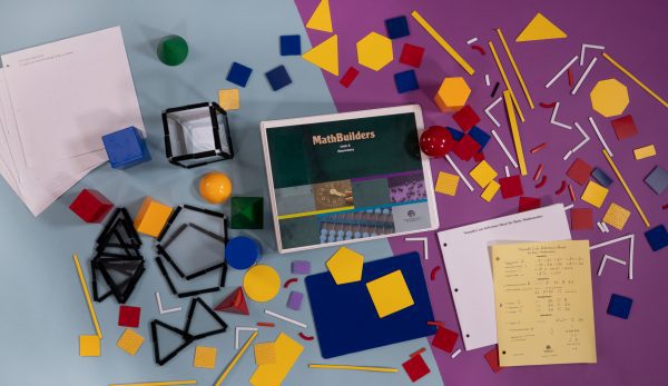 Bird's eye view of MathBuilders Unit 6 Kit: Geometry spread out to show the kits’ components including a felt board, textures shapes with hook/loop material backing, 3-D shapes, a guidebook, and more.