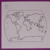 paper map of the earth with braille at top