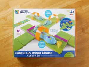The Code and Go Mouse box on a table.