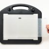Hand placing Dycem on Mini Light Box