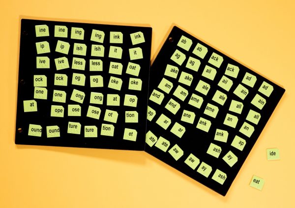 Word PlayHouse kit laid out including black felt board and yellow word manipulatives.