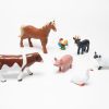 Cow, horse, chicken, goat, pig, sheep, and duck puzzle pieces, print and tactile overlays, and plastic model from the Animal Recipes Farm Set.