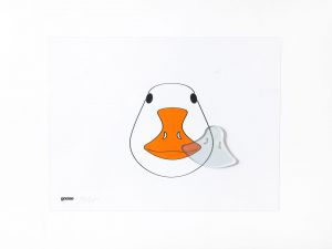 color overlay of a ducks face with a clear beak shaped puzzle piece laying askew