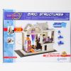 A close up of the BRIC: Structures box. On the cover is a BRIC: Structures project built inside a white building block structure. The Snap Circuits and ELENCO logos are in the bottom right.