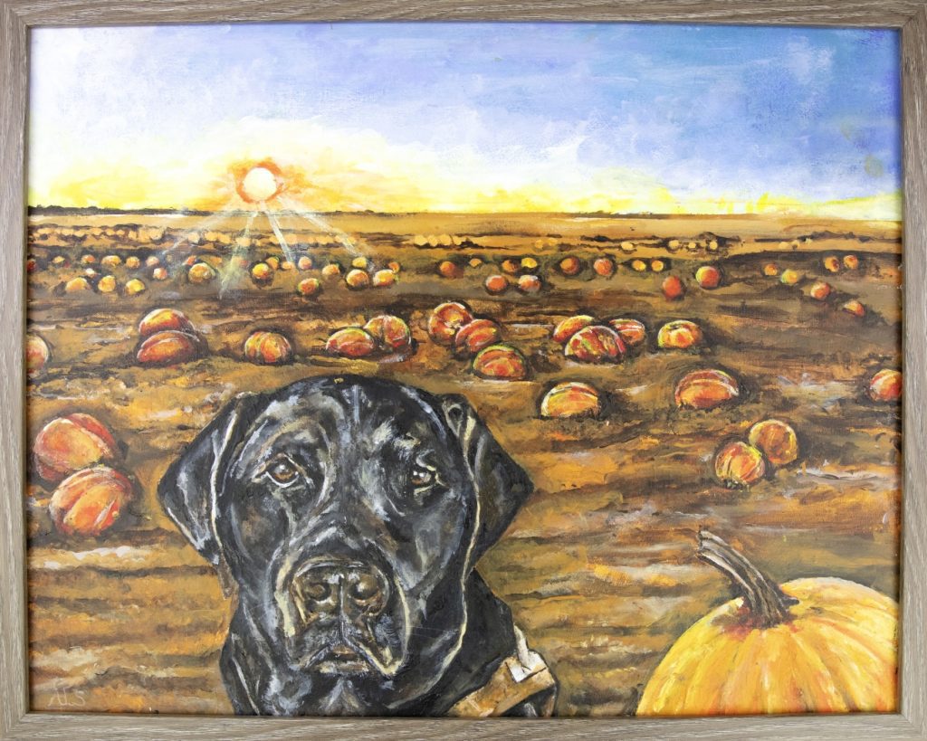Close up of an acrylic painting of a black dog's face. A little bit of a brown harness can be seen on his back. Next to him sits a large pumpkin.