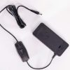 DC Supplement Adapter showing the dual polarity toggle switch.