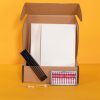 student starter pack box containing abacus, transcribing paper, and cell slate with saddle stylus