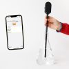 The SALS probe is held in a student's hand with the light detecting tip immersed in a flask filled with colored liquid. A cell phone image is on the right and shows the home screen of the SALS app with two saved sample tones.