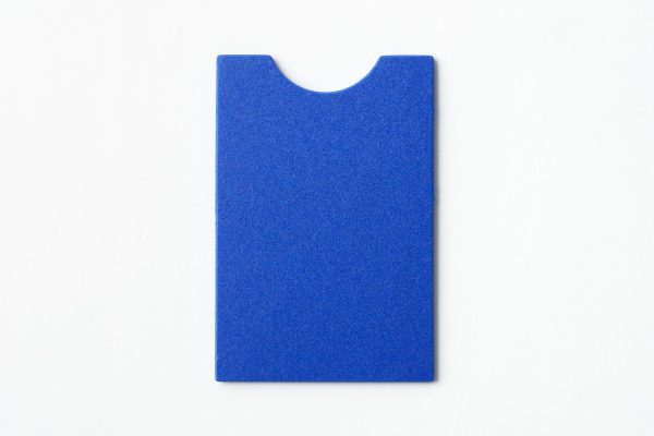 Single, undrilled blue “puzzle”-shaped card